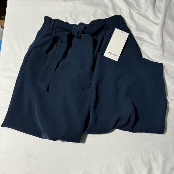 lululemon athletica Pants - NWT Lululemon Noir Crop Waist Tie Flowy Wide Leg True Navy Size 10.
